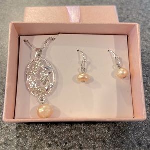 Costume necklace with matching earrings, new in box